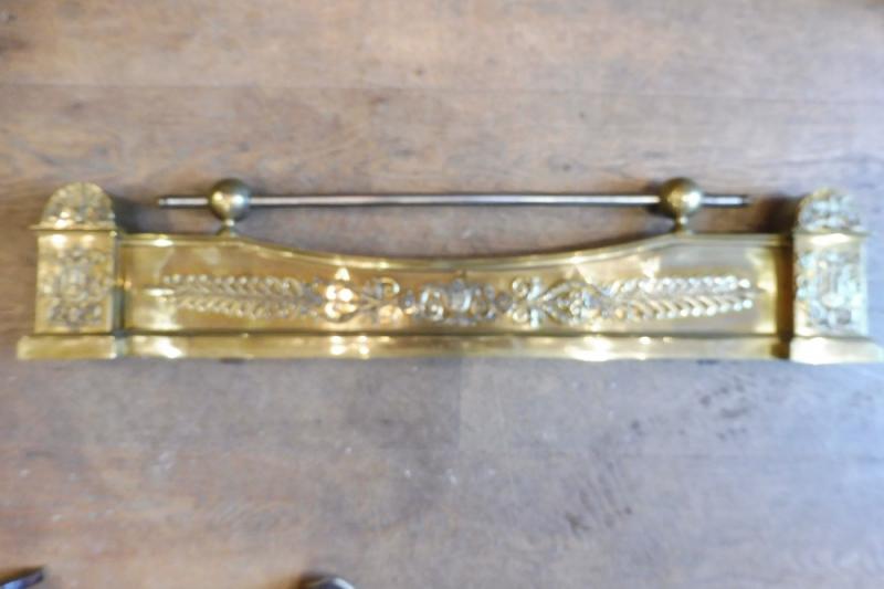 Barre de foyer en bronze , restauration 