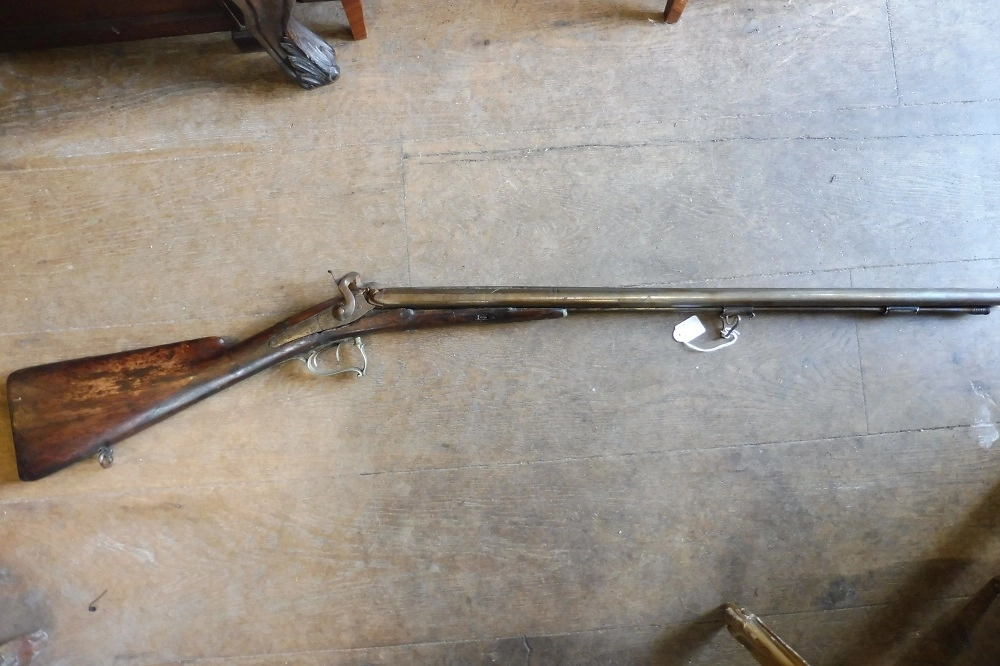 Fusil de chasse  ancien  à deux canons 